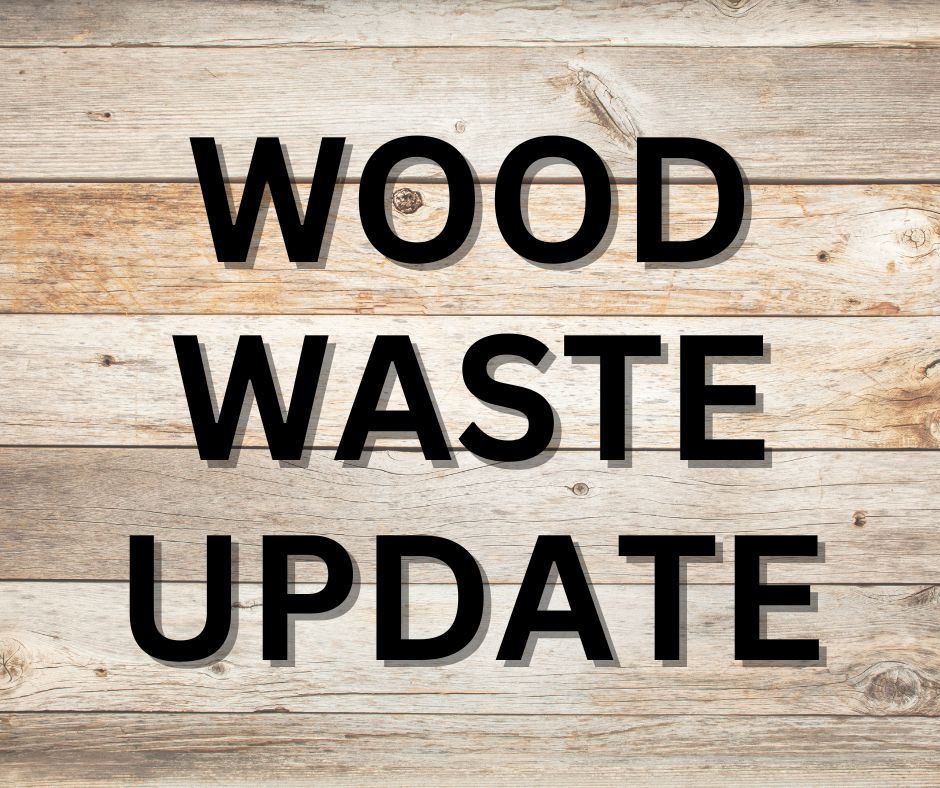 Wood Waste Update text on wood board background